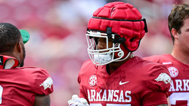 Razorbacks linebacker Chris "Pooh" Paul and Antonio Grier